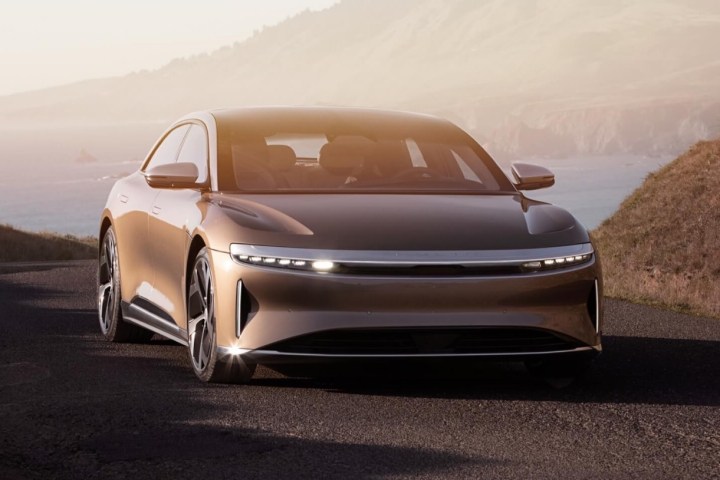 alt text: A silver Lucid Air parked on a road.