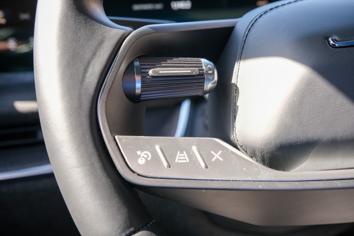 A closeup of the Steering Wheel buttons in a Lucid Air. 