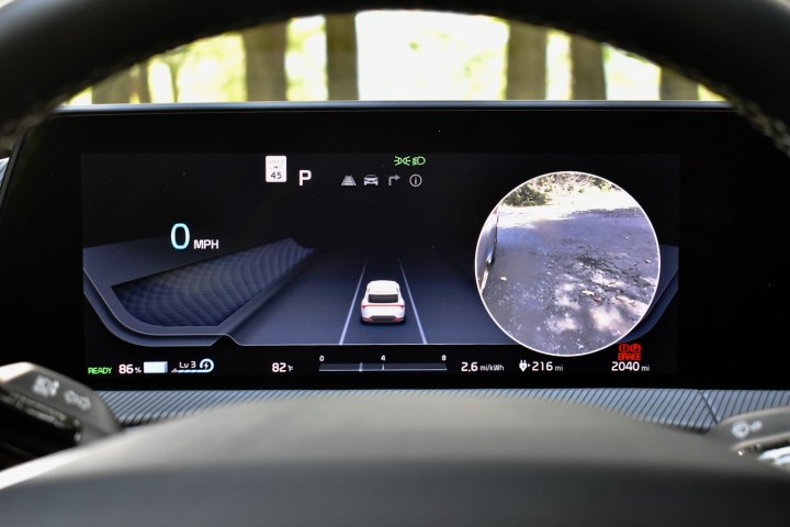 2023 Kia EV6 GT-Line instrument cluster with blind-spot camera view.