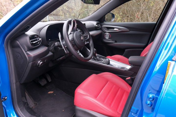 The front seats and foot wells of a Dodge Hornet R/T.