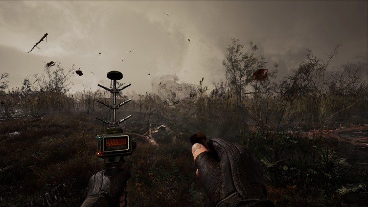 A character looks out over a dead landscape in STALKER 2.