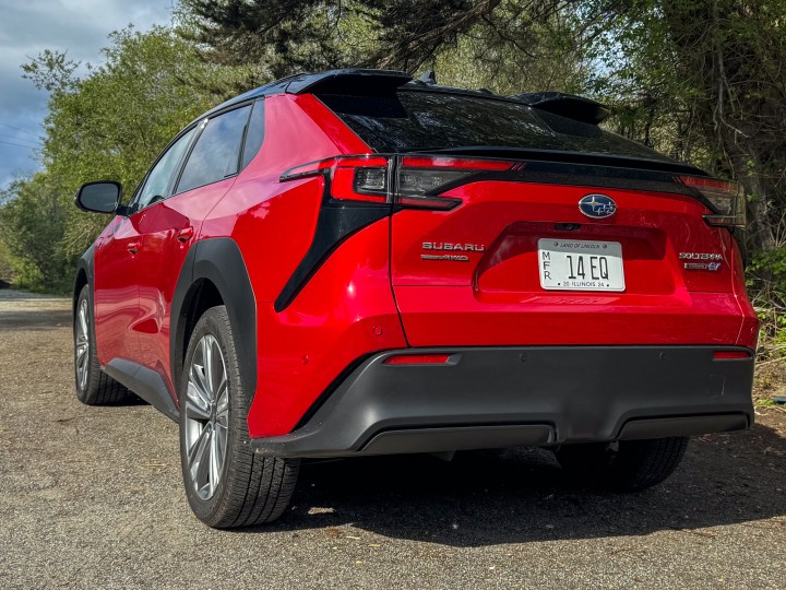 alt=Rear three-quarters view of the red 2024 Subaru Solterra