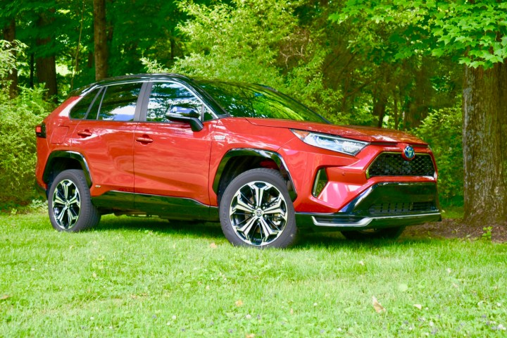 A 2021 Toyota RAV4 Prime in a park-like setting. 