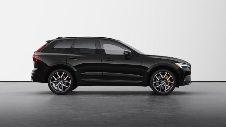 A black Volvo XC60 Recharge plug-in hybrid SUV.