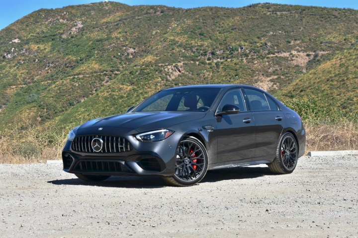 alt text: The 2025 Mercedes-AMG C63 S E Performance, a high-performance plug-in hybrid sedan, viewed from the front quarter angle.