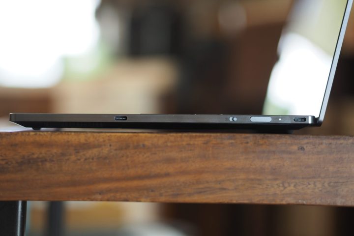 alt=Side view of the Lenovo ThinkBook 13x Gen 4, showcasing its slim profile and port selection.