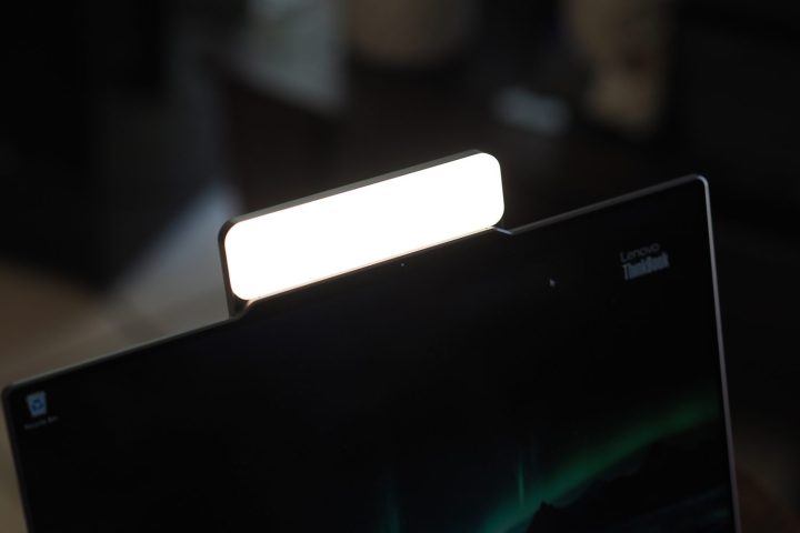 alt=The webcam of the Lenovo ThinkBook 13x Gen 4 illuminated by the attached Magic Bay Light.