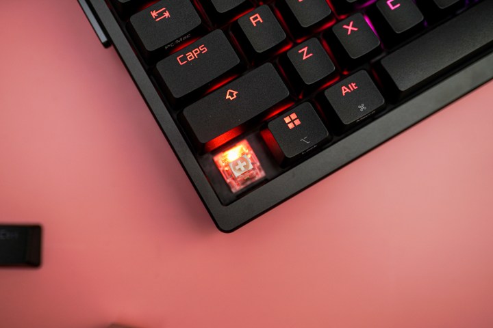 Switch on the Asus ROG Azoth Extreme keyboard.