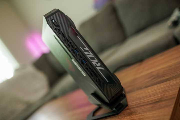 The Asus ROG 970 sitting on a coffee table.