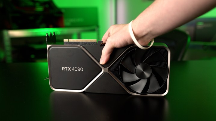 Holding the RTX 4090.