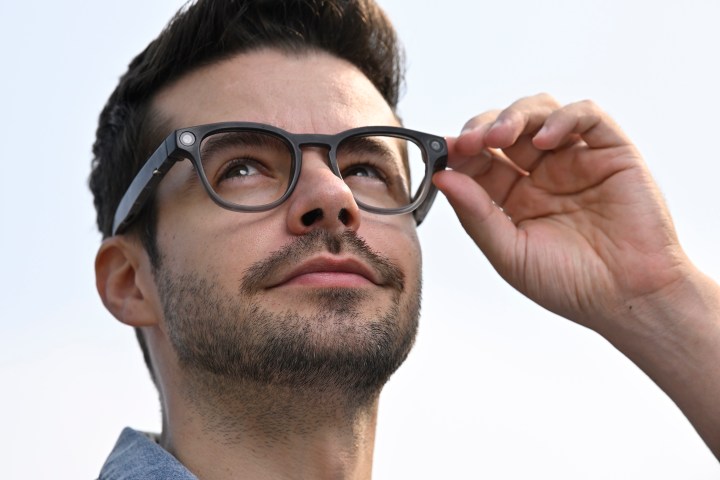 A person wearing the Looktech AI Glasses.