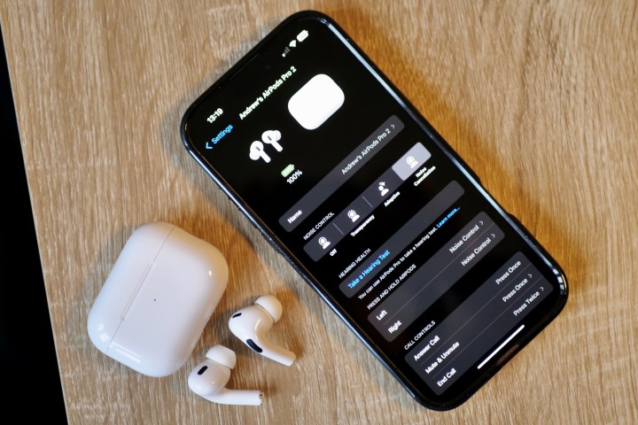 Apple iPhone 16 Pro Max with AirPods Pro 2.