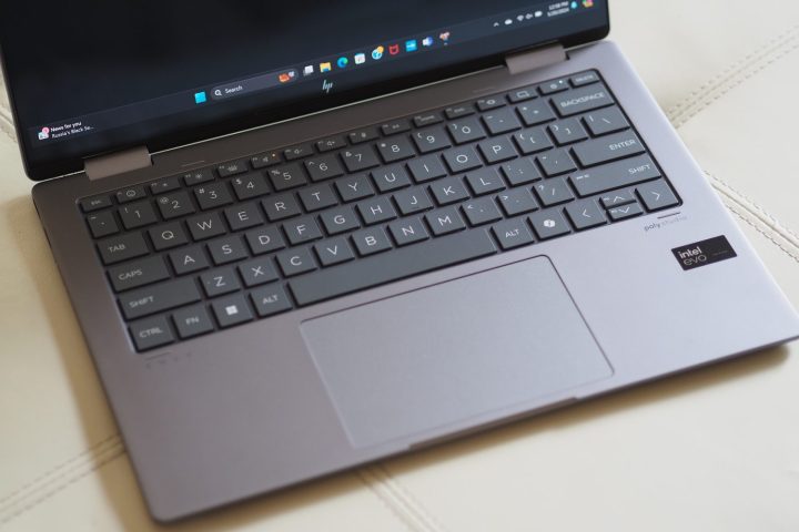 alt text: Close-up view of the HP Envy x360 14's keyboard and touchpad, highlighting key layout and size.