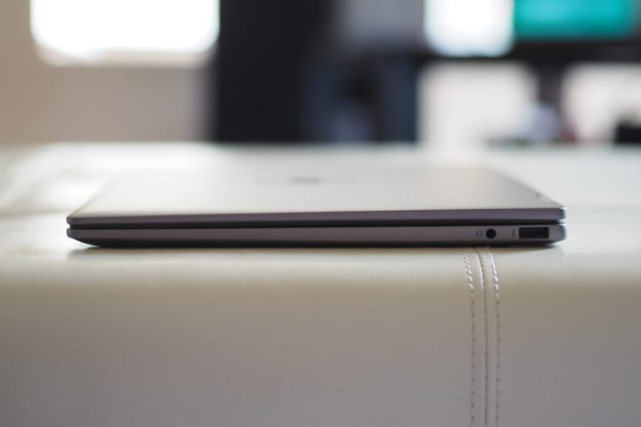 alt text: Right side view of the HP Envy x360 14 highlighting its ports, including the power button and audio jack.