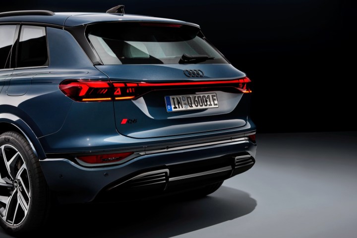 alt: Close-up of the rear digital lights on the 2025 Audi Q6 e-tron, showcasing their intricate design and OLED technology.