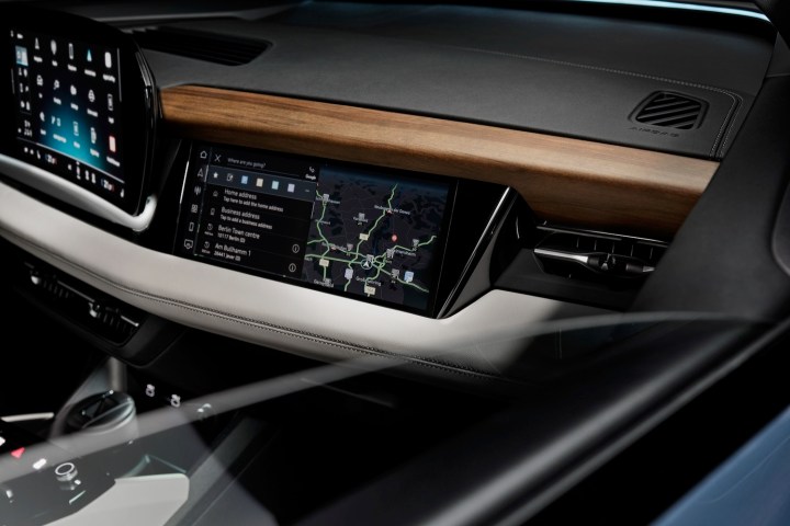 alt: The passenger-side screen in the 2025 Audi Q6 e-tron, offering entertainment and information access.