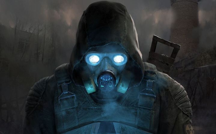 Key art for Stalker 2. A character in a lit-up gas mask and a gun on their back.