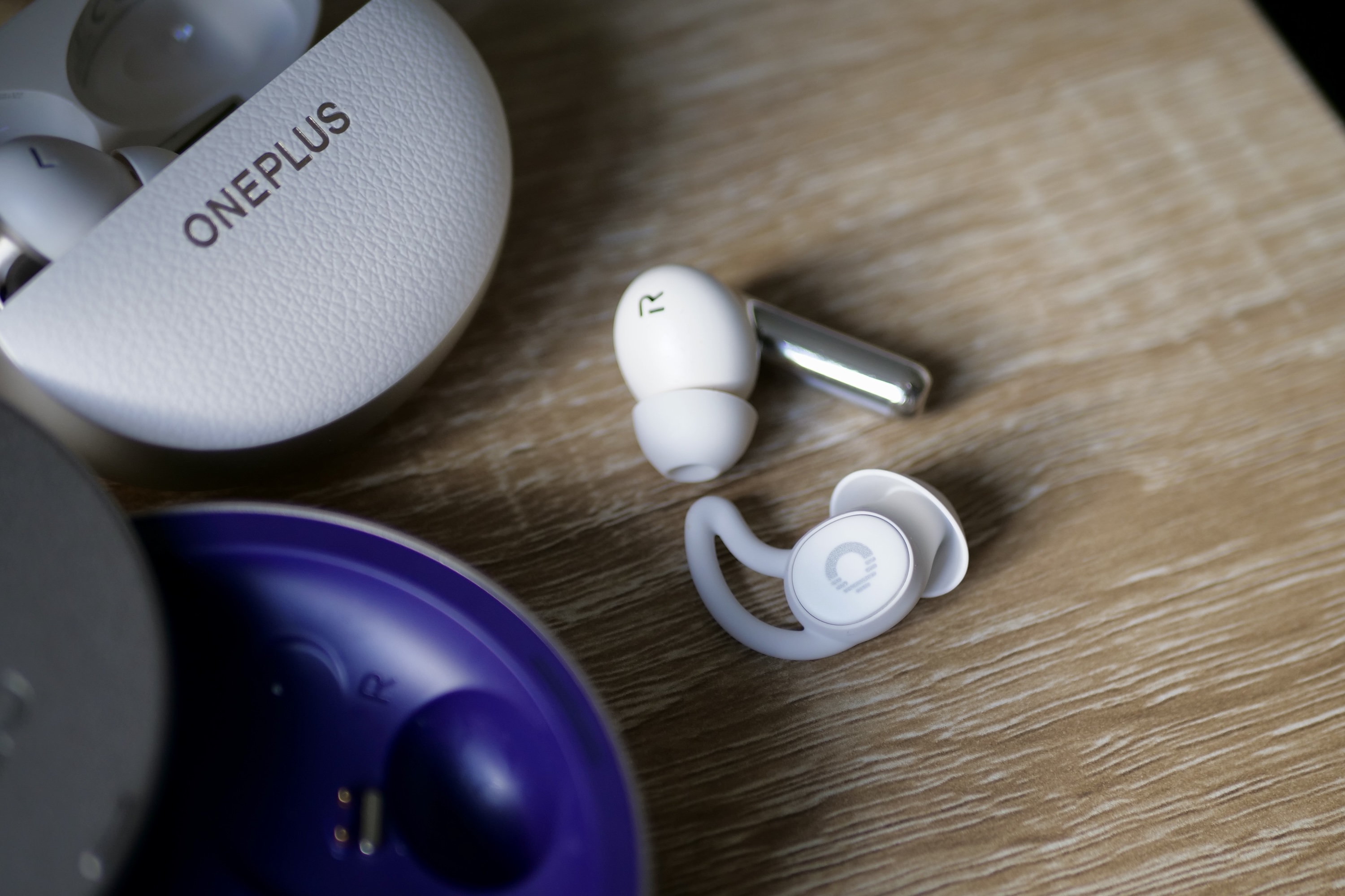 The Ozlo Sleepbuds with the OnePlus Buds Pro 3.