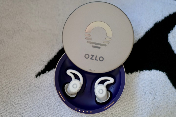 The open Ozlo Sleepbuds case showing the earbuds.