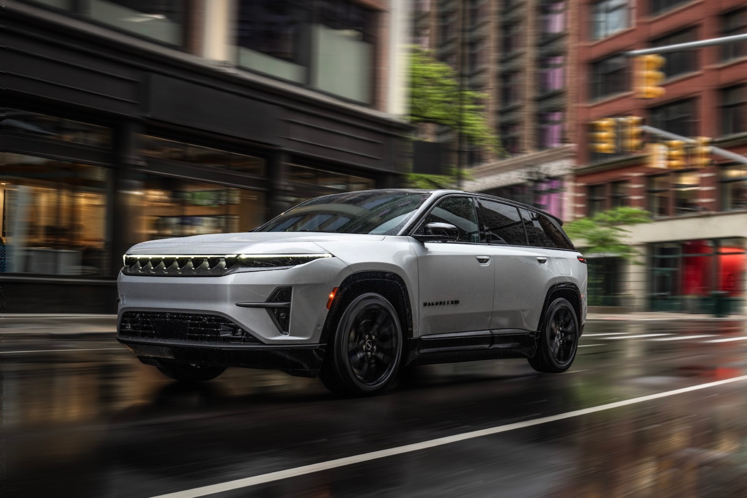 alt: Front view of the 2024 Jeep Wagoneer S on a city street.