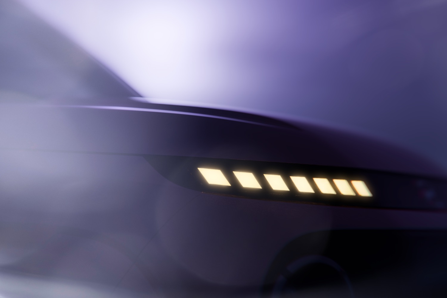 Teaser image showing the headlight of the Hyundai Inster.