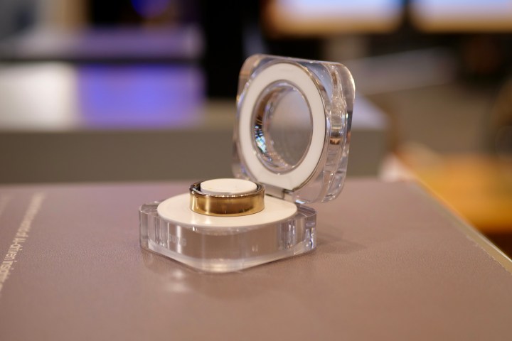 The Samsung Galaxy Ring in its charging case.