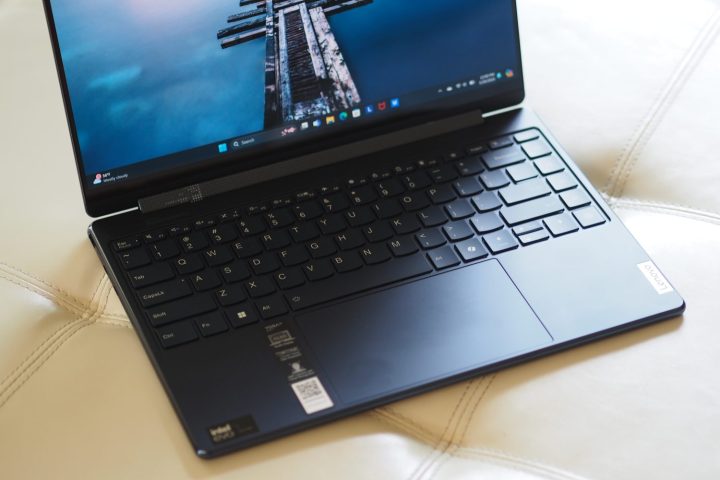 alt text: Top-down view of the Lenovo Yoga 9i Gen 9, showcasing the keyboard layout and spacious touchpad.