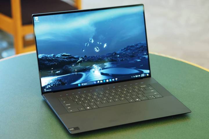 The XPS 16 open on a table.