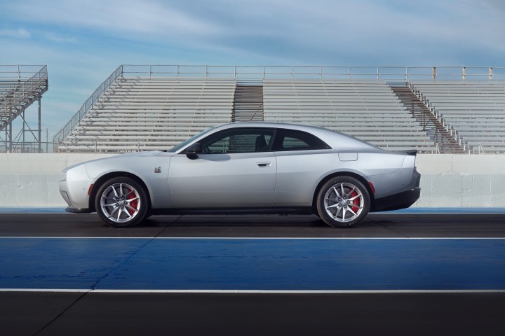 alt: Profile view of the 2024 Dodge Charger Daytona highlighting its coupe design.