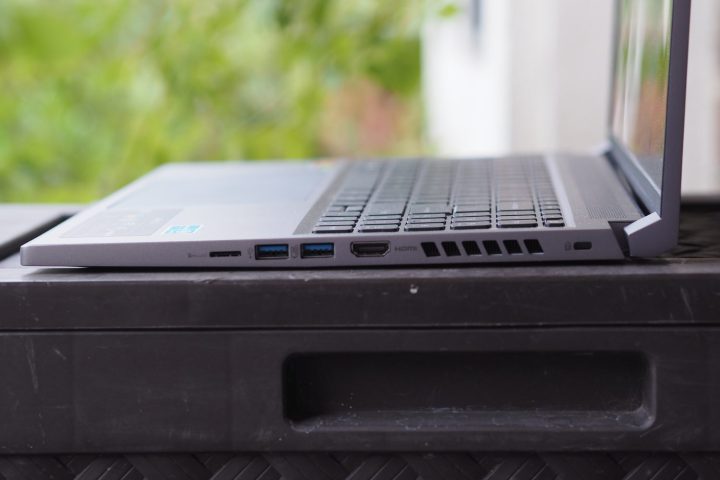 Acer Swift X 16 side view showing ports, vents, and lid.