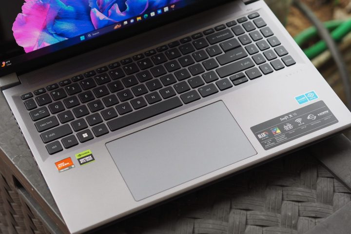 Acer Swift X 16 top down view showing keyboard and touchpad.