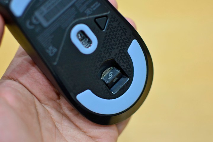 The dongle storage compartment on the Corsair M75 Air wireless gaming mouse.