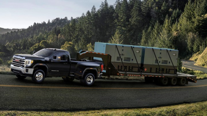 Alt text: The 2020 GMC Sierra HD truck, powered by a 6.6L Duramax Turbo-Diesel V8 engine, produces 445 horsepower and 910 lb.-ft. of torque, enabling it to tow up to 35,500 pounds.