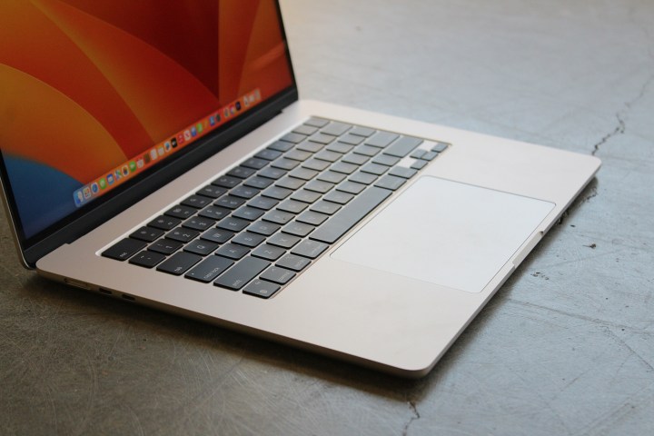 alt text: A close-up view of the keyboard and trackpad on a 15-inch Apple MacBook Air.