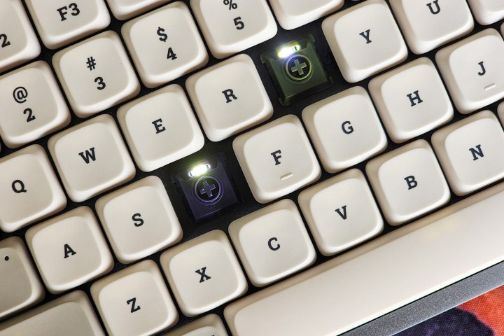 alt: Lofree Flow with white Retro keycaps on a desk.