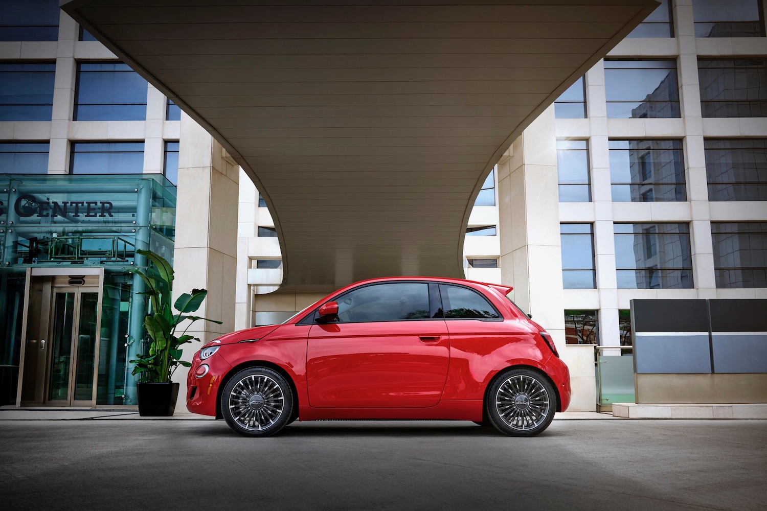 Alt text: A side profile view of the 2024 Fiat 500e emphasizing its small size and two-door design.