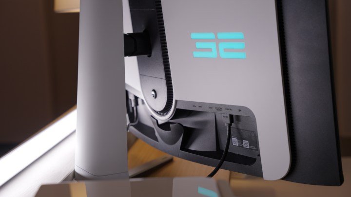 alt text: Close-up view of the port selection on the Alienware 32 QD-OLED, featuring HDMI, DisplayPort, and USB connections, enabling versatile connectivity for various devices.