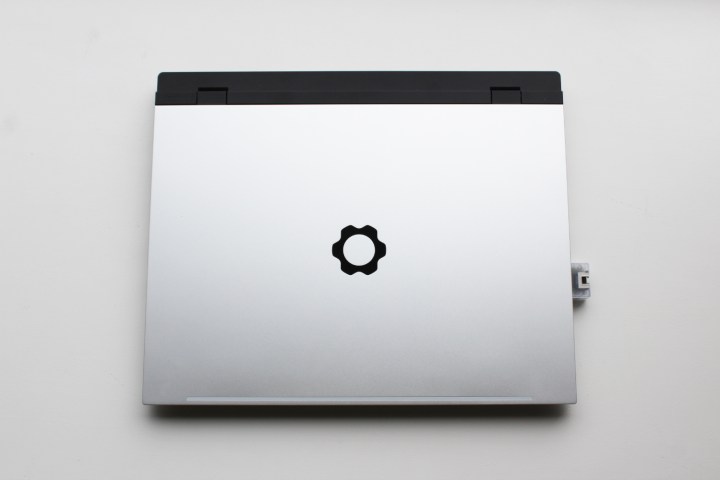 alt text: The closed lid of the Framework Laptop 16, showcasing its dual-tone silver and black design, reminiscent of the MacBook Pro.