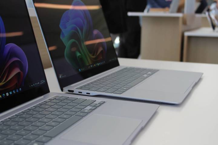 alt: The Samsung Galaxy Book4 Edge in both 14-inch and 16-inch sizes displayed on a table, showcasing their relative sizes and design.