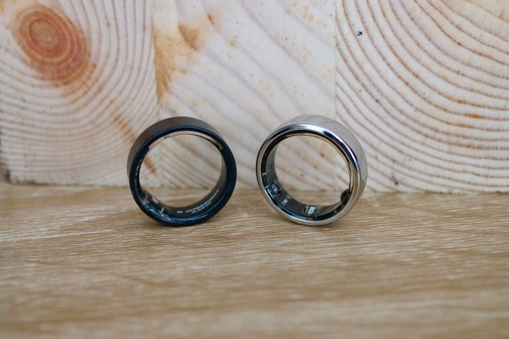 alt: The Ultrahuman Ring Air (left) and Oura Ring (right) placed together, highlighting their design and size differences.