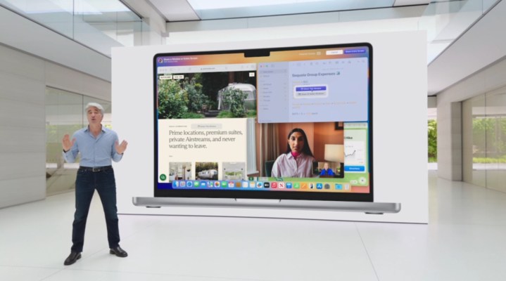 alt: A presenter demonstrates new features on a MacBook Pro during WWDC 2024, showcasing the integration of window tiling within the macOS ecosystem.