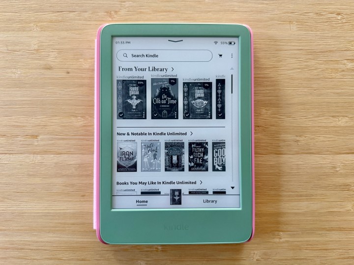 On your Kindle, navigate to your library and select a book to read.