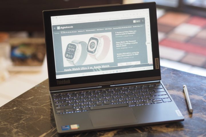 alt: Lenovo ThinkBook Plus Gen 4 in clamshell mode with the e-ink display visible on the lid.