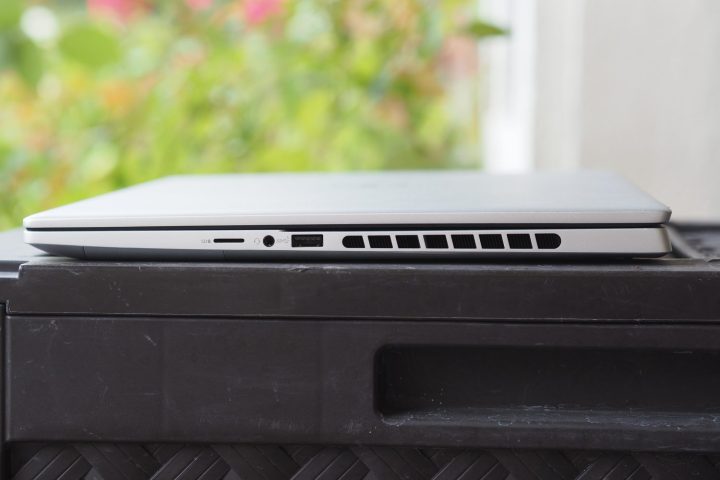 alt text: The right side of the Dell Inspiron 16 Plus shows its ports and ventilation grills.