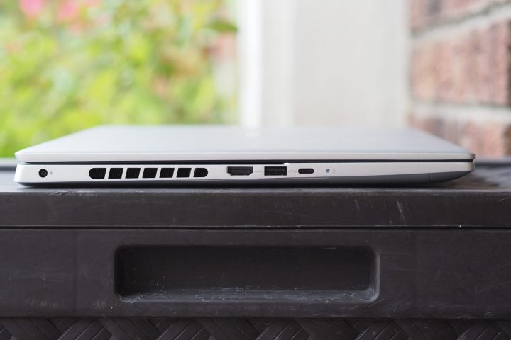 alt text: The left side of the Dell Inspiron 16 Plus displays its ports and ventilation grills.