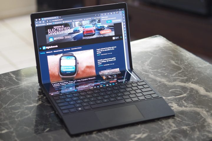 alt: The HP Spectre Foldable PC displaying its dual-screen functionality with the keyboard positioned on the lower half.