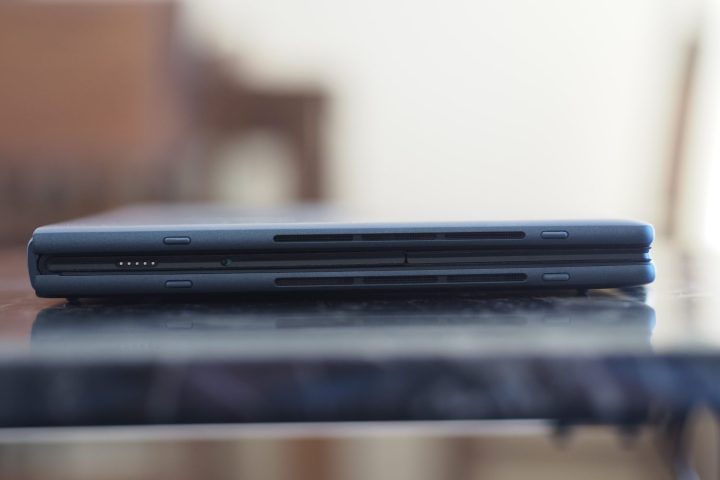 alt: A close-up view of the left side of the HP Spectre Foldable PC, showcasing one of the speakers.