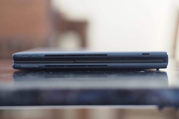 alt: A close-up view of the right side of the HP Spectre Foldable PC, showcasing a speaker and a Thunderbolt 4 port.