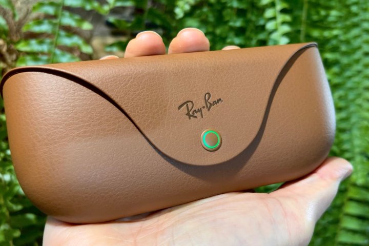 Alt: The Ray-Ban Meta Smart Glasses charging case, featuring a synthetic leather exterior and an LED indicator.