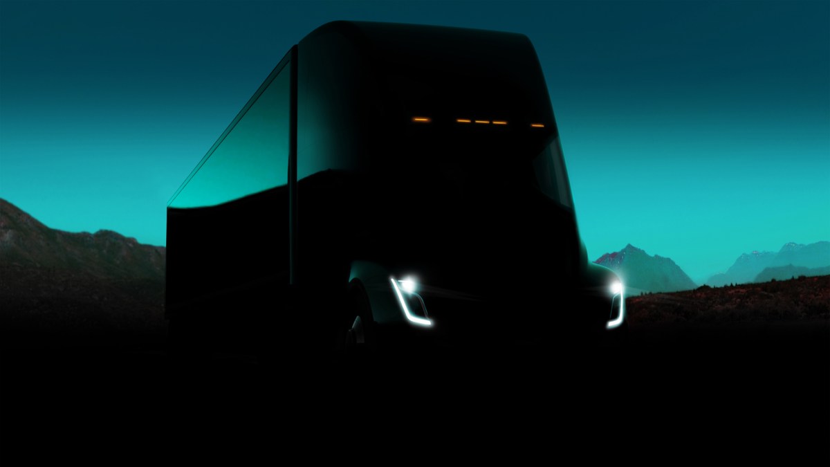 alt text: Tesla Semi truck driving on a highway